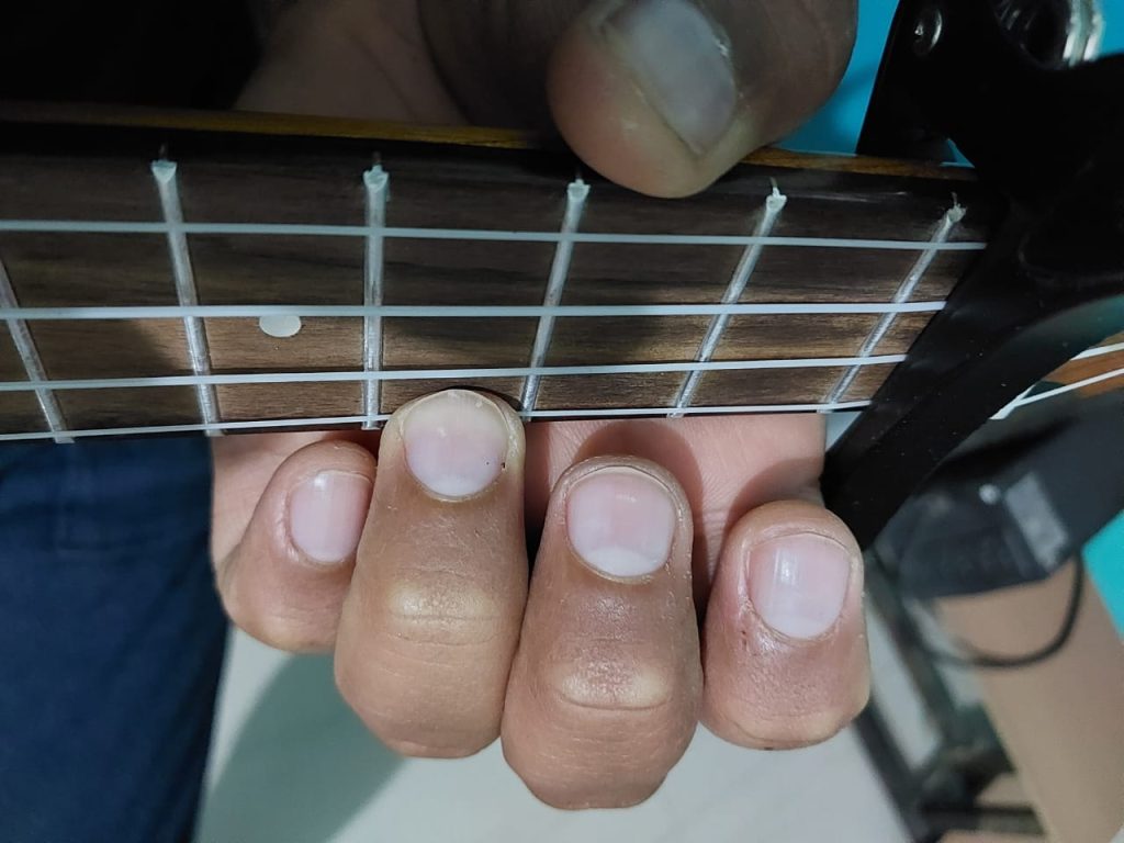 How Hard Should You Press Ukulele Strings